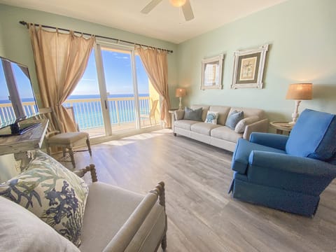 Living room with queen sleeper sofa and breathtaking gulf views