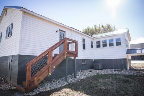 Staircase for Rear Entrance/Exit Access.