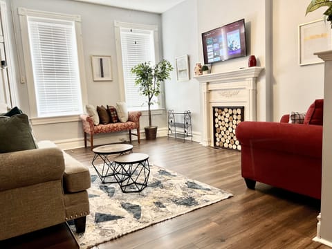 Nicely decorated living room with Roku TV