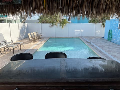 Pool with Sun Ledge and Tiki Bar