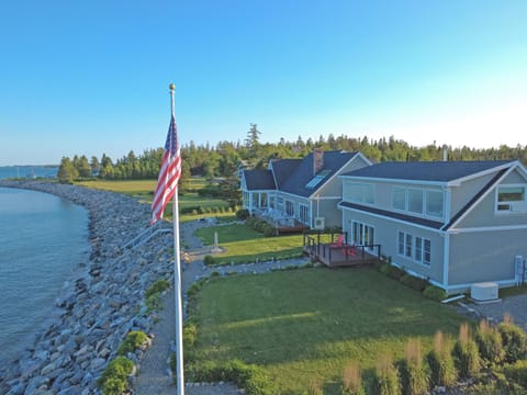 Oceanfront, beach access(private) entire property.  5 BR 4 Bathrooms total.  