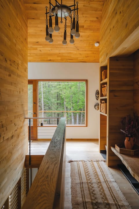 Warm wood tones throughout the entryway