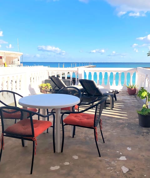 Sip your morning coffee on the balcony and take in the enchanting ocean waves for a perfect coastal morning.