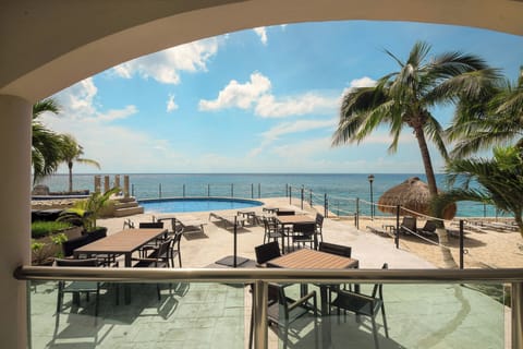 Step outside each morning to be greeted by never-ending views of the Caribbean Sea!