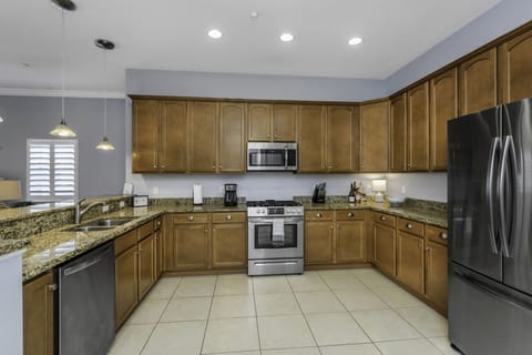 Large kitchen fully stocked with everything you need to enjoy meals at home.