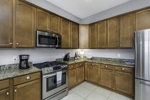 Large kitchen fully stocked with everything you need to enjoy meals at home.