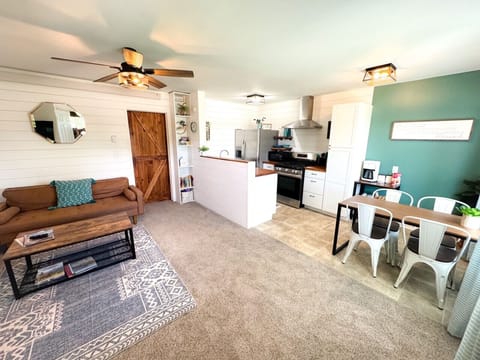 View from the front door - open layout with kitchen, living, and dining for a bright and open space.