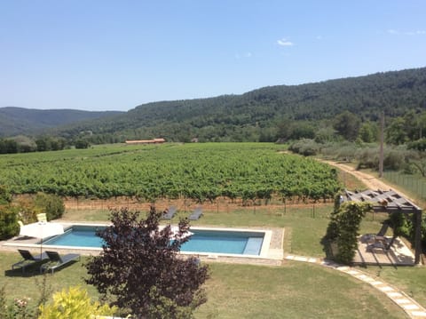 View from bedroom 3 over the pool and the vines to Salernes Golf