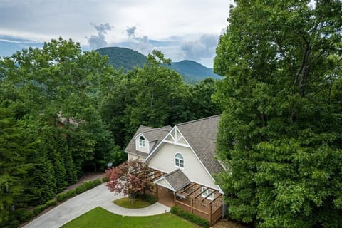 Outdoor, Cinna-Bahn Aerial View concrete driveway with parking spaces for 4 Vehicles