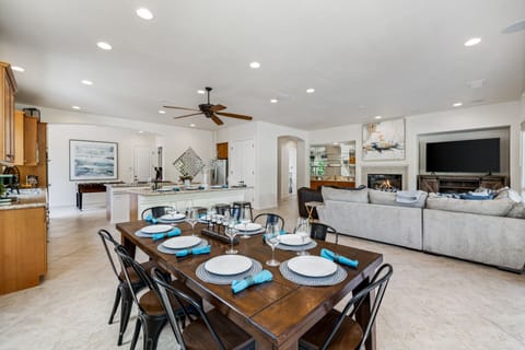 The indoor dining room is next to the living room and kitchen and has seating for 8.