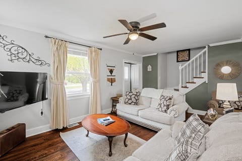 Cozy up in style! Relax on two plush sofas, enjoy the added aesthetic of the decorative fireplace, and catch your favorite shows on the Roku TV.