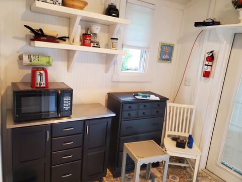  Stainless steel cooking island  and dresser