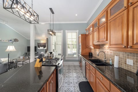 Full kitchen with two ovens, gas stove, microwave, coffee maker, refrigerator