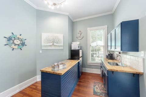 Kitchen with Refrigerator, 2 burners, coffee maker, microwave, air fryer