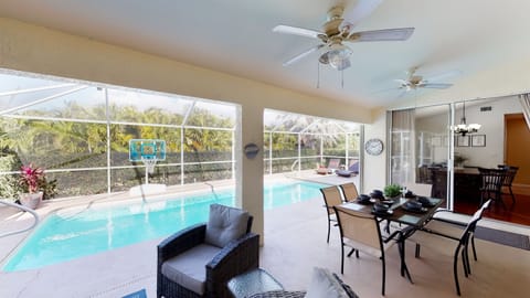 Realax on the wicker patio furniture whil watching the kids swim!