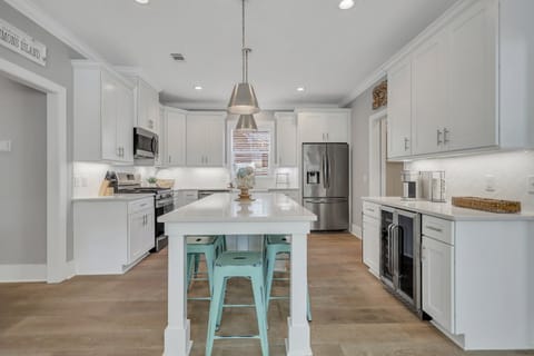 Kitchen with a large island and seating for five