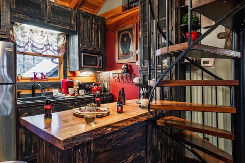 The cutest dinkiest kitchen that is fully stocked for your cooking pleasures