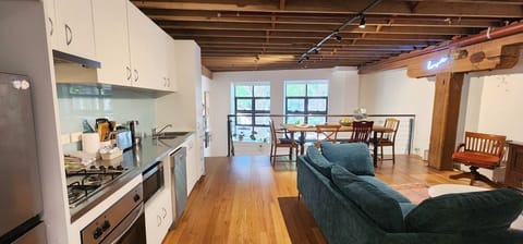 Cool New York loft style vibes. Open plan living, dining and kitchen