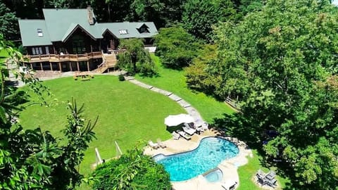 Everything you could want for a fun family or friend getaway! Multiple firepits, Lots of seating on the deck and around the pool. 