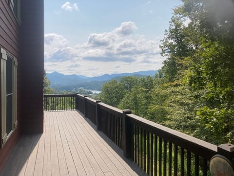 Wrap around deck offers views ... babbling creek is just off the side deck. 