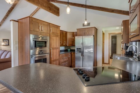 Stainless steel appliances with lots of counter space in the kitchen