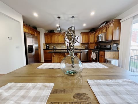 Kitchen connects to the dining space for an open floor plan concept. 