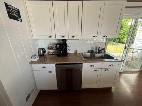 We provide dish soap, dishwasher soap, fresh sponge, paper towel & garbage bags