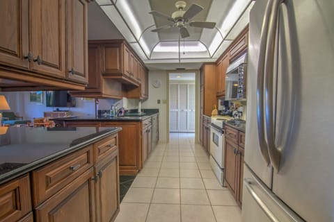 The Kitchen Has Lots Of Cabinets and Counter Space!