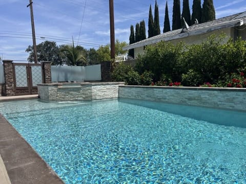 Sparkling In-ground Pool and Jacuzzi