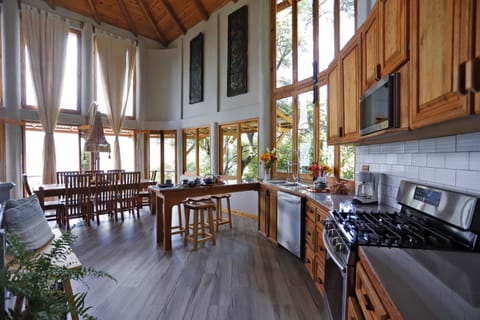 Open Plan Kitchen, Breakfast Bar & Dining Area, with amazing views of the lake.
