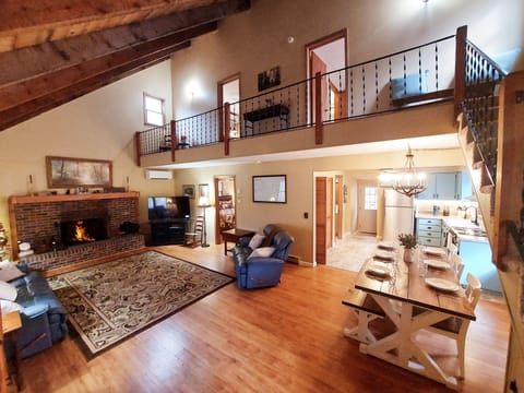 Two-Story Open Living Room, Log-Beam Tongue & Groove Ceilings