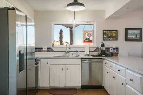 dishwasher, coffee maker and art