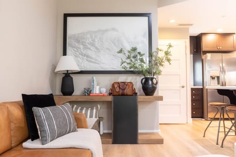 This monochrome curling wave image is the inspiration for the home's design