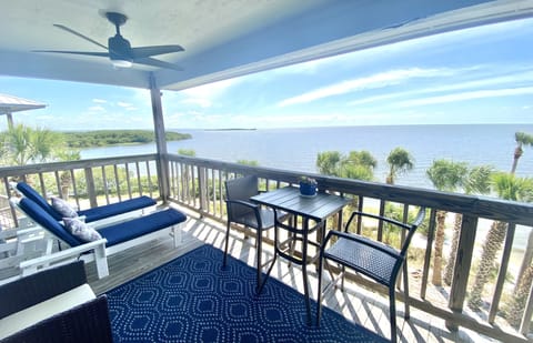 Spacious balcony with plenty of seating and first row seat to dolphin watching!