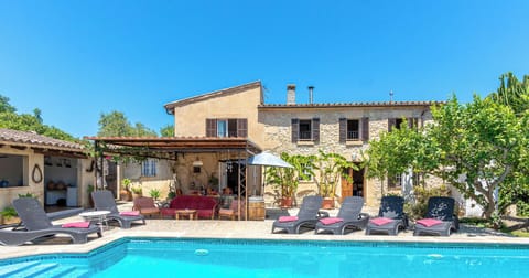 Pool and facade of Ca na Pereta villa in Pollensa