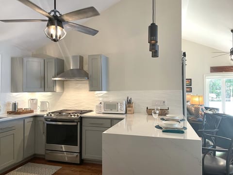 Waterfall Quartz Counter & Gas Range 