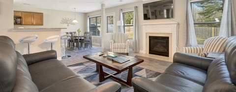 Multiple seating options for family movie night. Scan the QR Code for an immersive virtual tour of our stunning property.