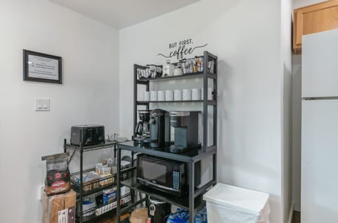 Carolina Joy House - kitchen features a fully stocked coffee bar. 