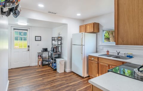 Carolina Joy House - kitchen with electric stove/oven, fridge, coffee bar, etc.