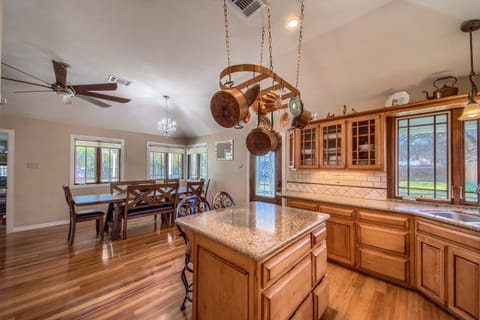 Seating for 8 at the dining table and 2 additional seats at the breakfast bar.
