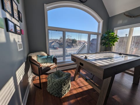 Grab a book, throw your feet up and relax in the corner, or wait your turn at the air hockey table.