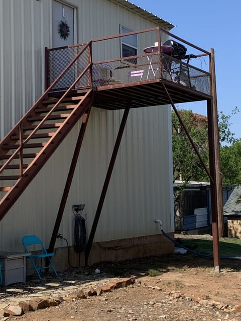 Steps leading to deck and apartment 