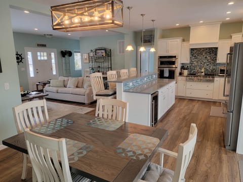 View from Dining area into kitchen and main level living room.