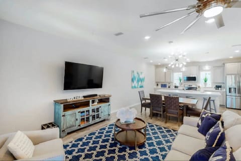 Open concept living, dining and kitchen provides space for the entire family