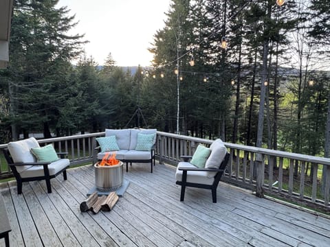 Enjoy outdoor lounging on the expansive deck (stove available spring/fall) 