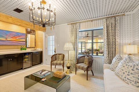 Living room and wet bar.