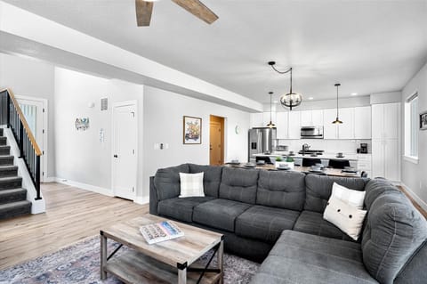 - Relax on the plush sectional with clear sightlines to the bright and spacious kitchen
