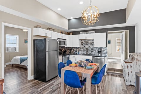 Fully Stocked Kitchen and Dining Area