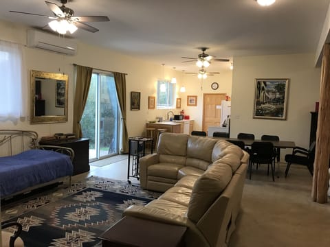 Living area viewed from the hallway leading to the bedrooms. 