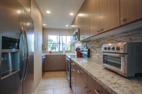 This large galley style kitchen has everything you need to cook up the perfect family dinner.